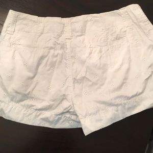 white shorts w/flower design